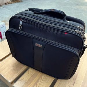 Tumi laptop roller suitcase for carryon